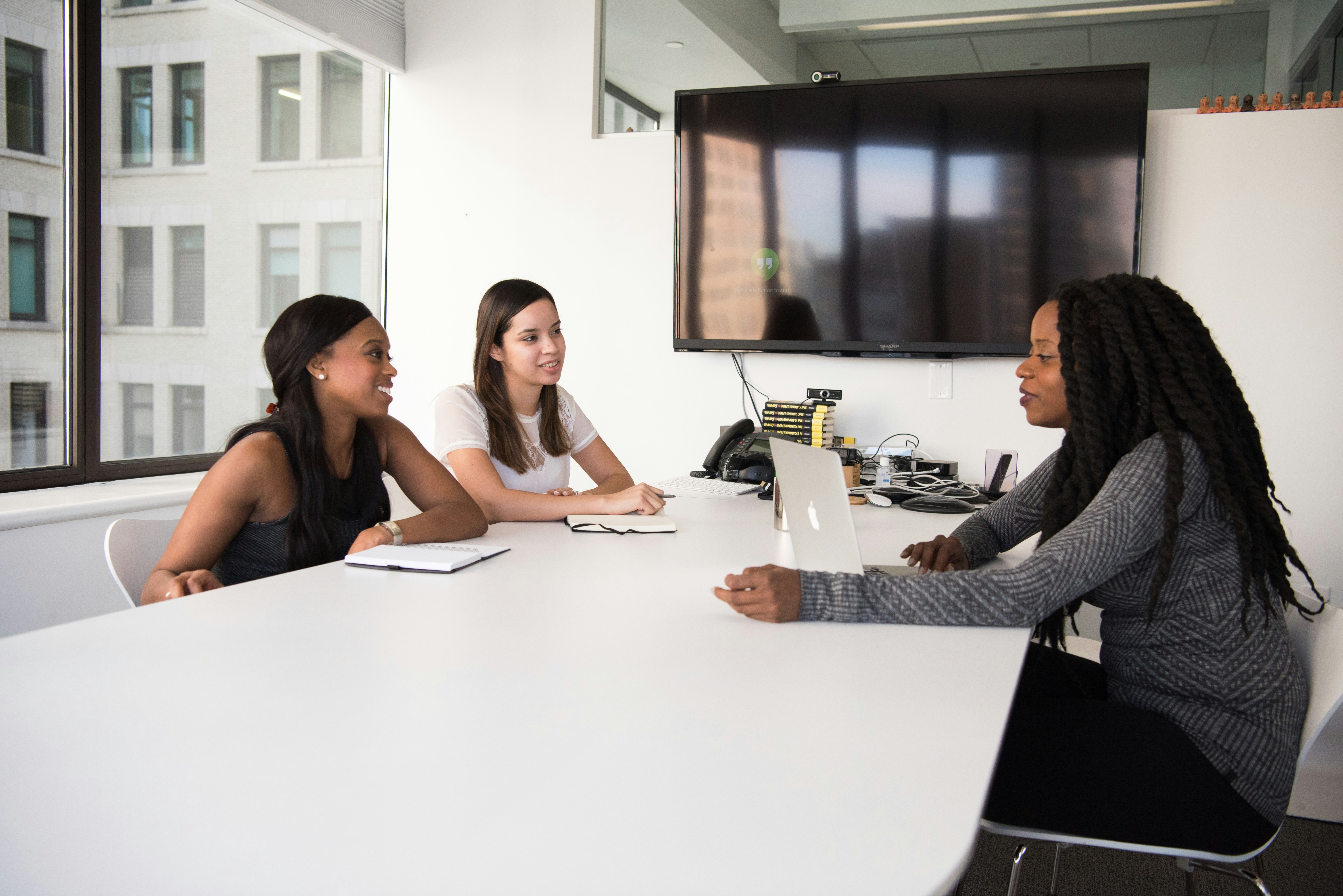 Recruiters working a desk